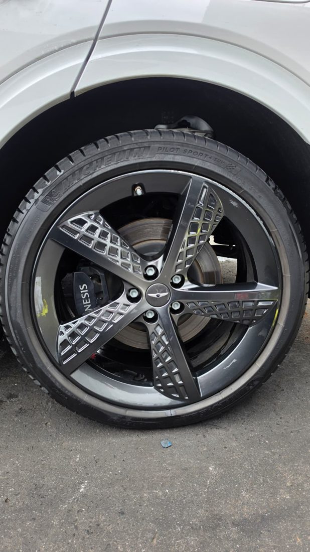 Damaged alloy wheel before repair