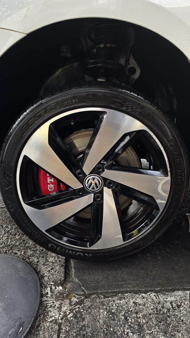Damaged alloy wheel before repair